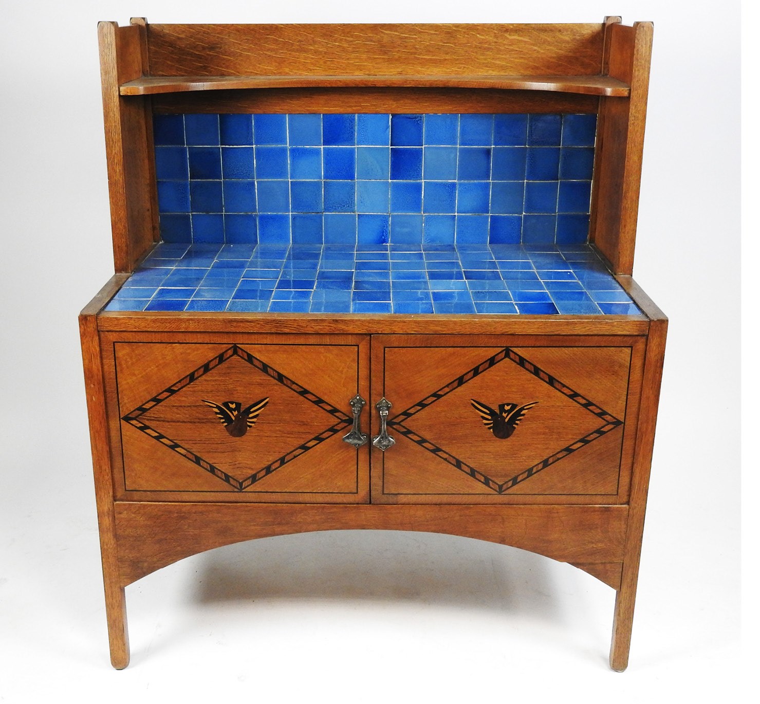 Lot 145, A late Victorian Scottish style oak and inlaid Arts and Crafts bedroom suite