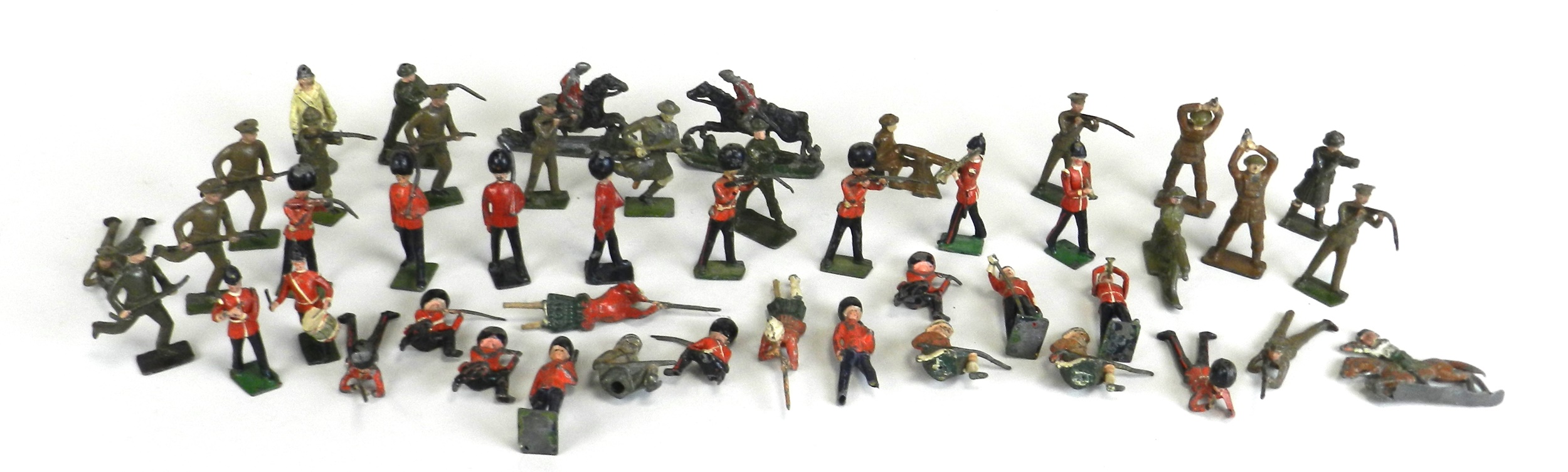 A collection of post-WWI 'lead' soldiers, including 11 from the Guards regiment