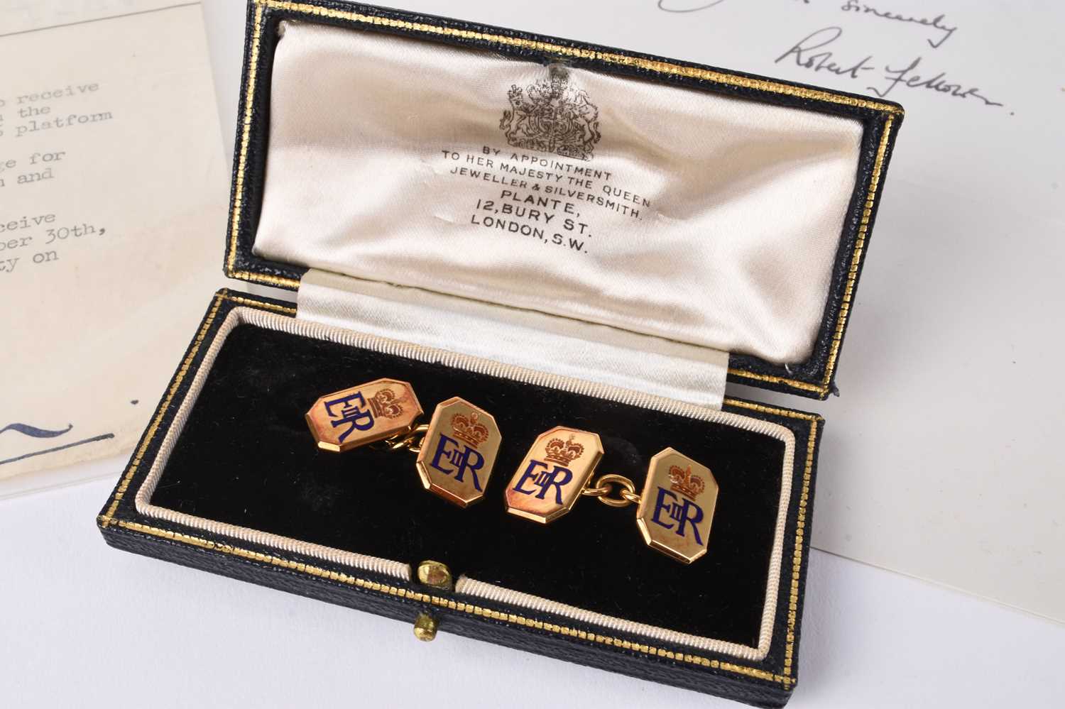 The cufflinks presented to Royal Train head conductor Albert George Hart by Queen Elizabeth II in 1961 which sold for £1,800. Halls Fine Art