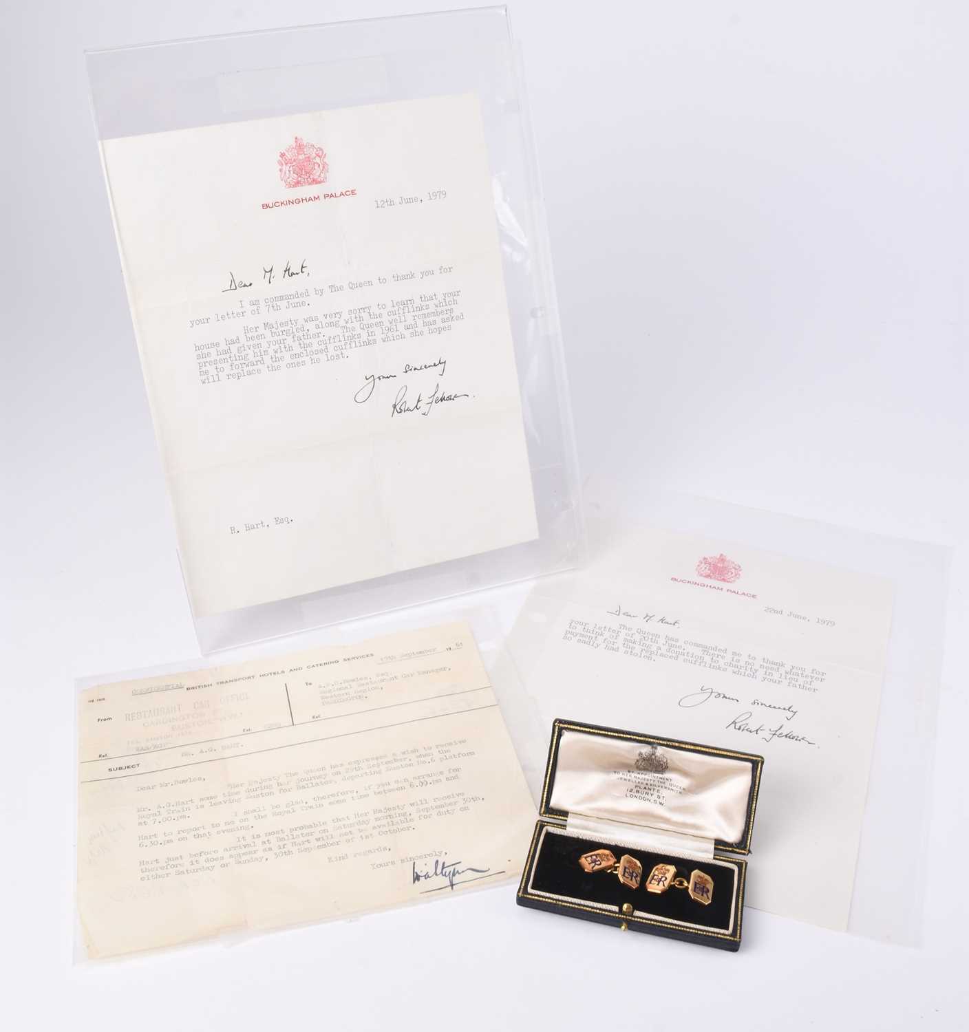 The cufflinks presented to Royal Train head conductor Albert George Hart by Queen Elizabeth II in 1961 which sold for £1,800. Halls Fine Art