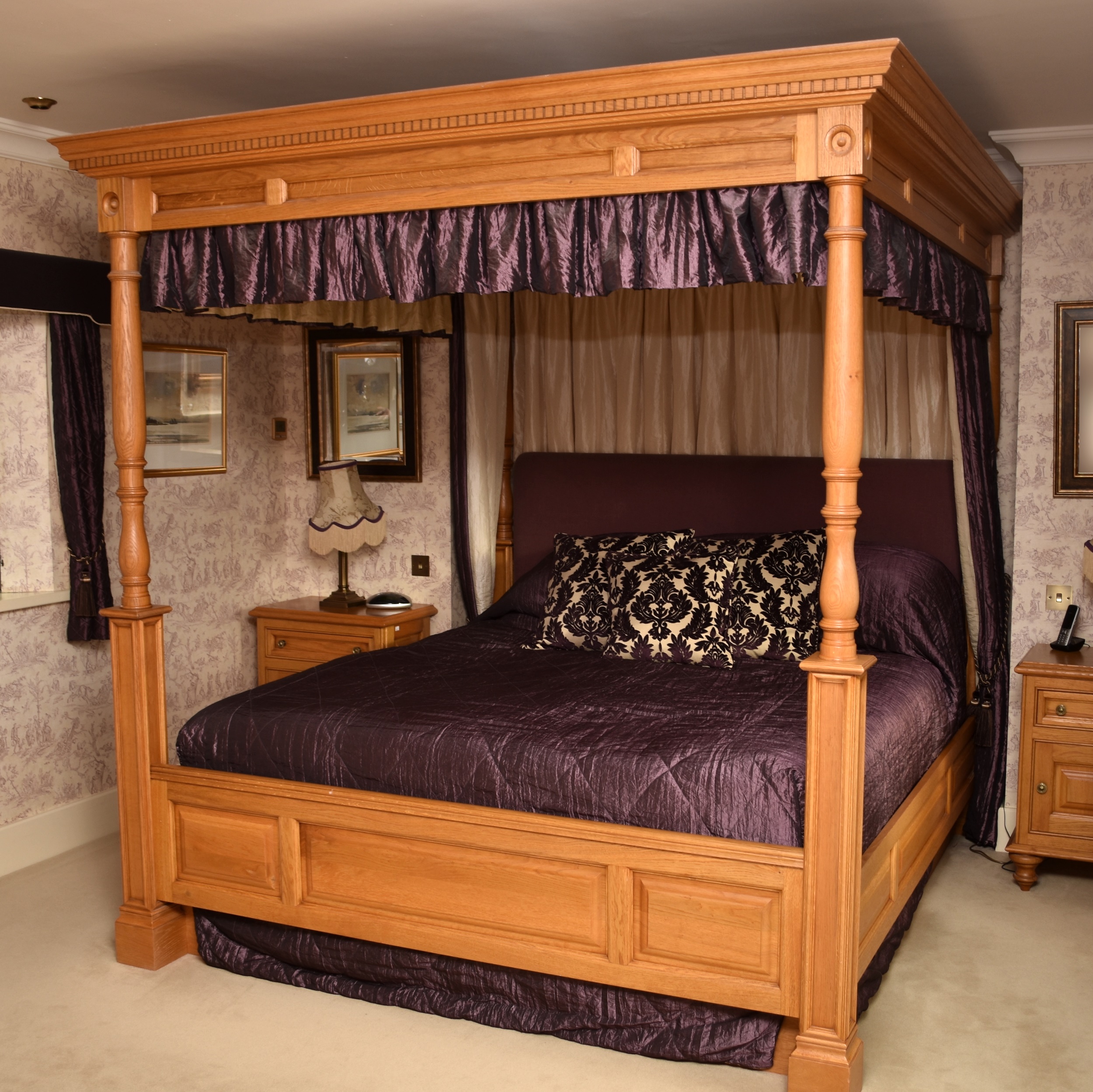 A recent and impressive Clive Christian light oak 'four-poster' bed, in the 18th century style