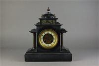 Lot 112 - A Victorian black marble mantel clock, with...