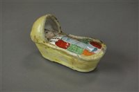 Lot 179 - An early 19th century Staffordshire cradle...