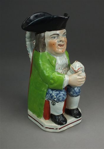 Lot 182 - A Staffordshire pearlware toby jug, early 19th...