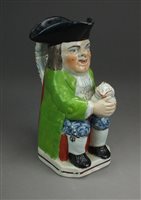 Lot 182 - A Staffordshire pearlware toby jug, early 19th...