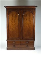 Lot 5 - A Victorian mahogany combination wardrobe, the...