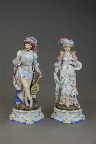 Lot 168 - A pair of French porcelain figures of male and...