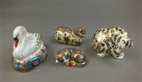 Lot 211 - Four Royal Crown Derby paperweights to include...