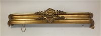 Lot 234 - A pair of gilt pelmets each with scalloped...