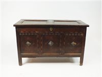 Lot 19 - A 17th century joined oak chest with indented...