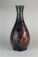 Lot 189 - A large Moorcroft 'Finches' vase of baluster...