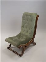 Lot 265 - A Victorian walnut framed nursing chair with...