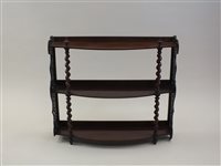 Lot 266 - A Victorian mahogany three height wall shelf...