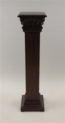 Lot 52 - A reproduction mahogany torchere stand, the...