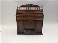 Lot 198 - A late Victorian or Edwardian walnut cased...