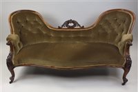 Lot 60 - A Victorian walnut framed settee, the double...