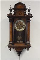 Lot 104 - A walnut and parquetry style Vienna style wall...