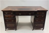 Lot 405 - An Edwardian mahogany pedestal desk attributed...