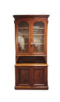 Lot 262 - A 19th century mahogany glazed cabinet...