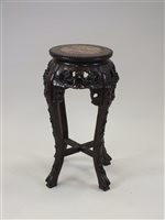 Lot 73 - A Chinese rosewood and marble inset urn stand,...