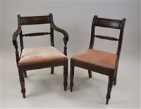 Lot 270 - A set of four Regency mahogany bar back dining...