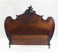 Lot 370 - A 19th century mahogany French Rococo style...