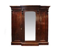 Lot 359 - A 19th century mahogany breakfront triple...