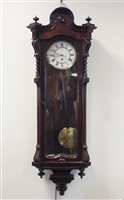 Lot 106 - A rosewood cased Vienna style wall clock, late...