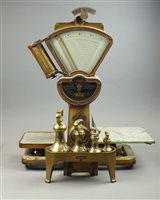 Lot 246 - A set of early 20th century kitchen weighing...