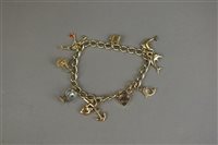 Lot 130 - A 9ct gold curb link bracelet with attached...