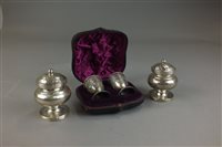 Lot 160 - A cased pair of Victorian silver pepperettes,...