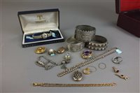 Lot 136 - Three silver hinged bangles, together with a...
