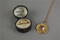Lot 140 - An 18ct gold Edwardian diamond and ruby double...