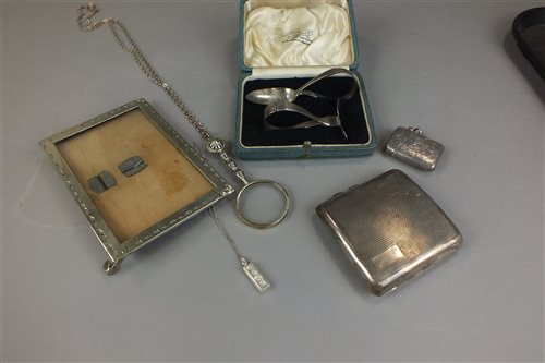 Lot 5 - A cased silver spoon and pusher, together with...