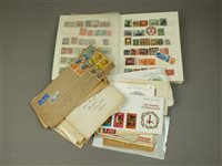 Lot 270 - A stamp album, together with a collection of...