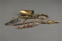 Lot 139 - A peridot and seed pearl bar brooch, together...