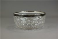 Lot 142 - An early 20th century silver mounted glass...