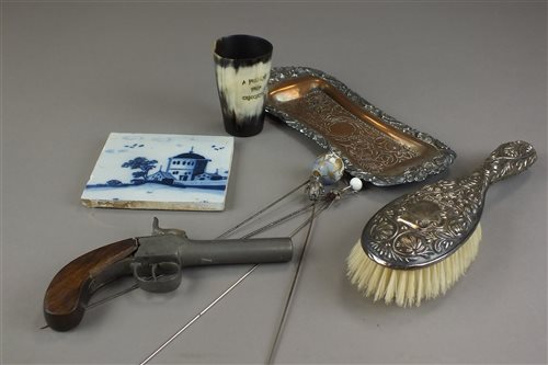 Lot 143 - A silver hat pin with teddy bear terminal,...