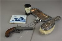 Lot 143 - A silver hat pin with teddy bear terminal,...