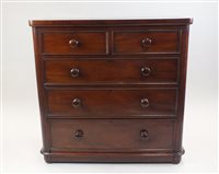 Lot 21 - A Victorian mahogany chest of drawers, the...