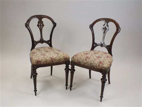 Lot 23 - A set of four Victorian walnut parlour chairs...