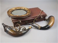 Lot 235 - A brown leather suitcase containing two 19th...
