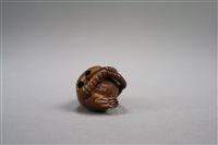 Lot 202 - A Japanese Carved Wood Netsuke of a Rat