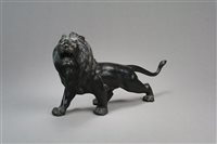Lot 195 - A Japanese Bronze figure of a Lion
