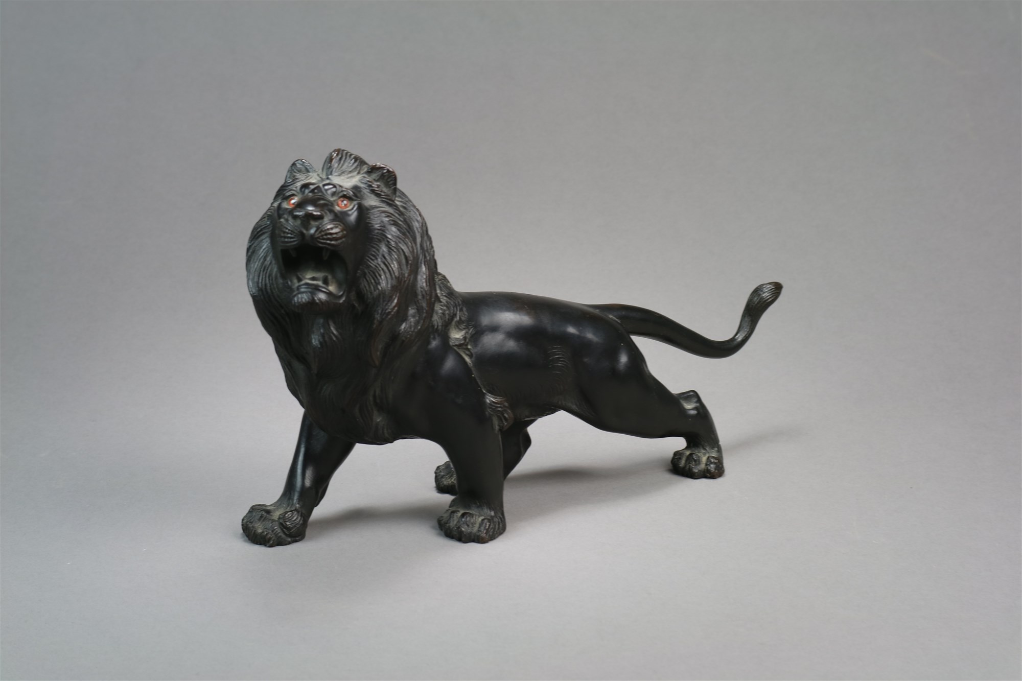 A rare Japanese bronze of a lion and an Asian rhino - Objects