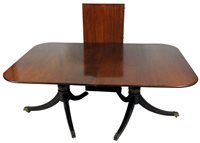 Lot 233 - A mahogany twin pillar dining table, 19th...