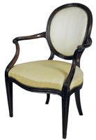 Lot 236 - A George III mahogany elbow chair, the oval...