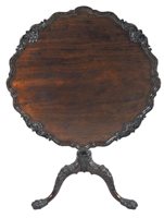 Lot 240 - A George III mahogany pie crust top tripod...