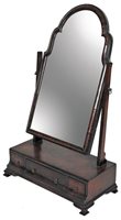 Lot 243 - A mahogany veneered toilet mirror, 18th...