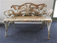 Lot 262 - A painted cast iron fern pattern garden seat,...